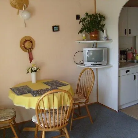 Agi *